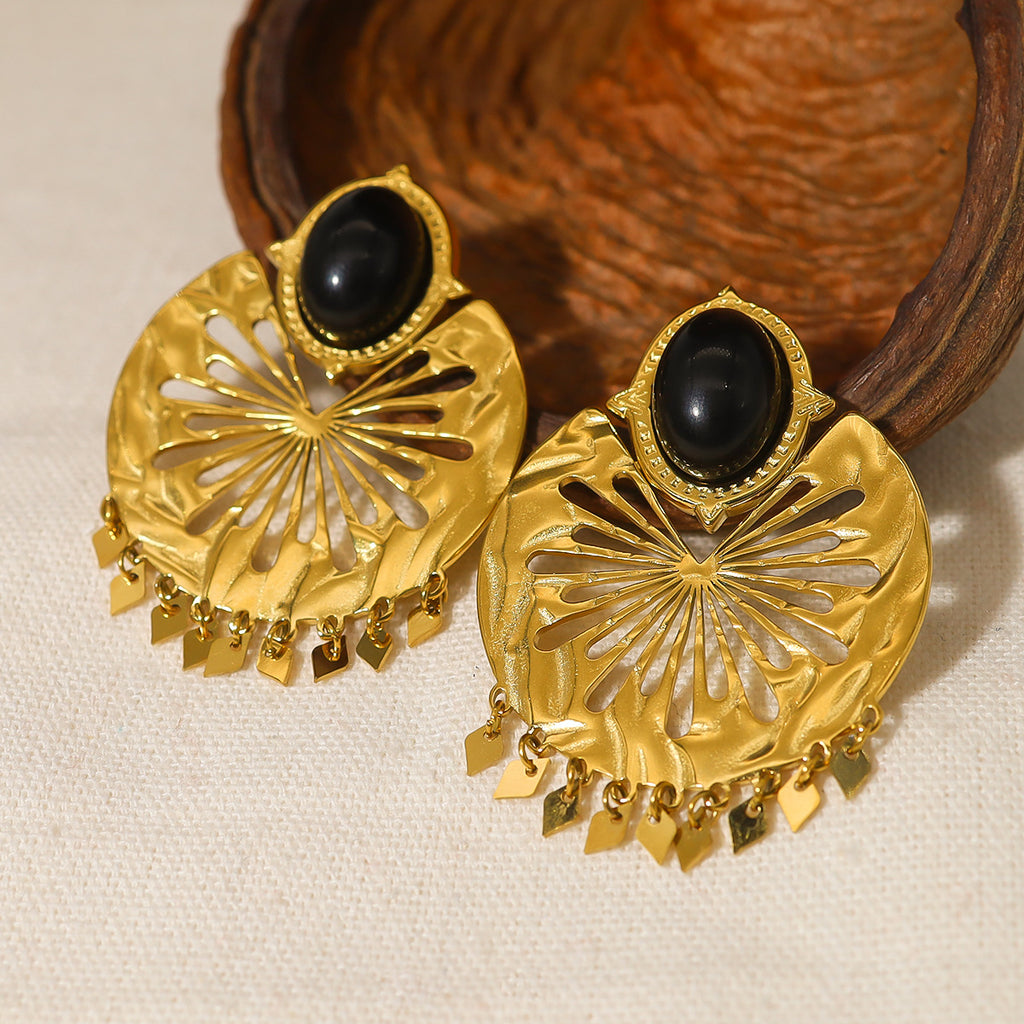 Boucles d’oreilles dorées géométriques en acier titane