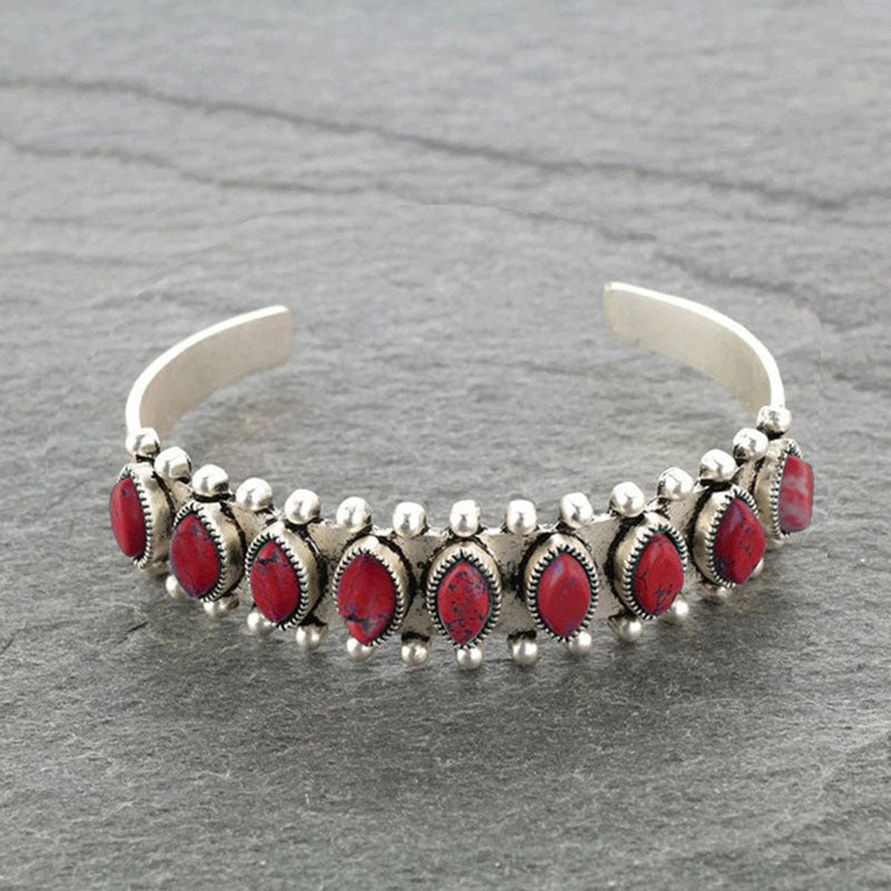 Bracelet ouvert en turquoise naturelle à motif antique