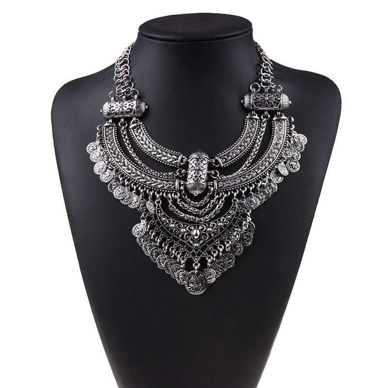 Collier argenté vintage à pendentifs