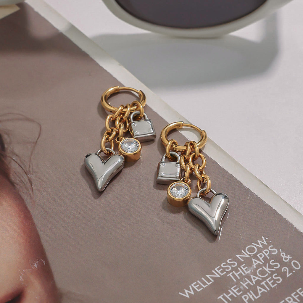 Boucles d’oreilles pendantes cœur en acier doré et zircon | LSDJ