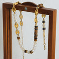 Collier doré perle et œil-de-tigre