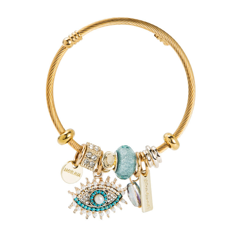 Bracelet œil avec cristal et détails plaqués or