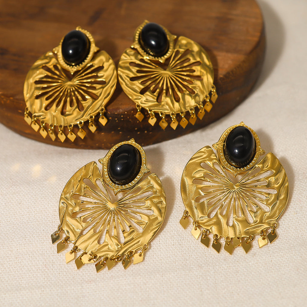 Boucles d’oreilles dorées géométriques en acier titane