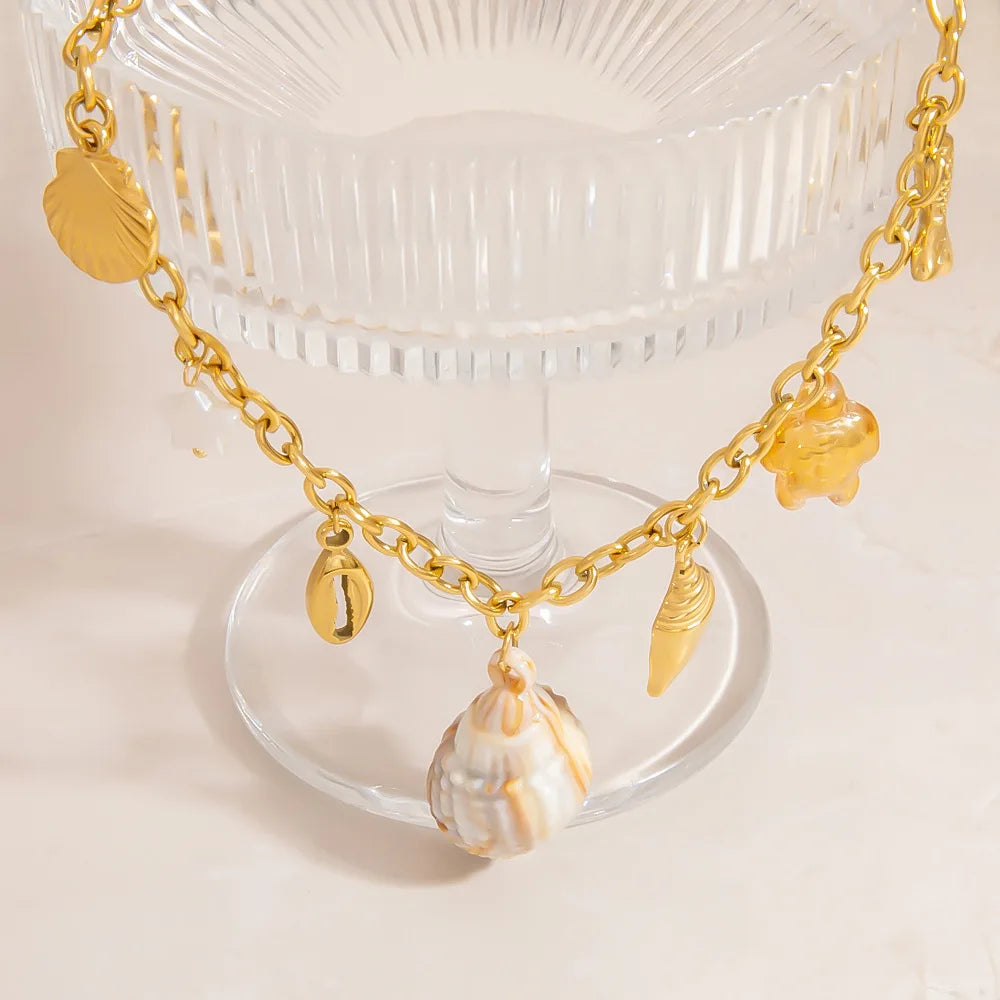 Collier coquillage doré en cuivre