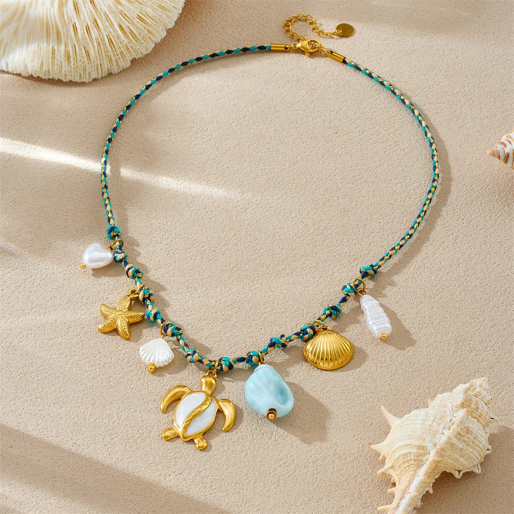 Collier doré tortue et étoile de mer