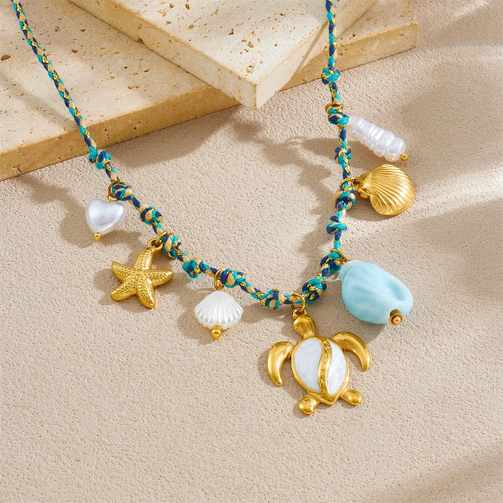 Collier doré tortue et étoile de mer