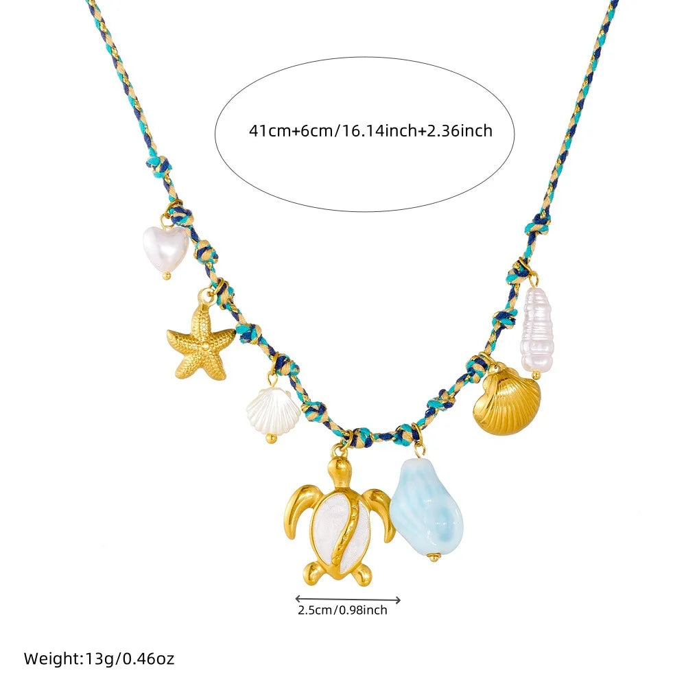 Collier doré tortue et étoile de mer