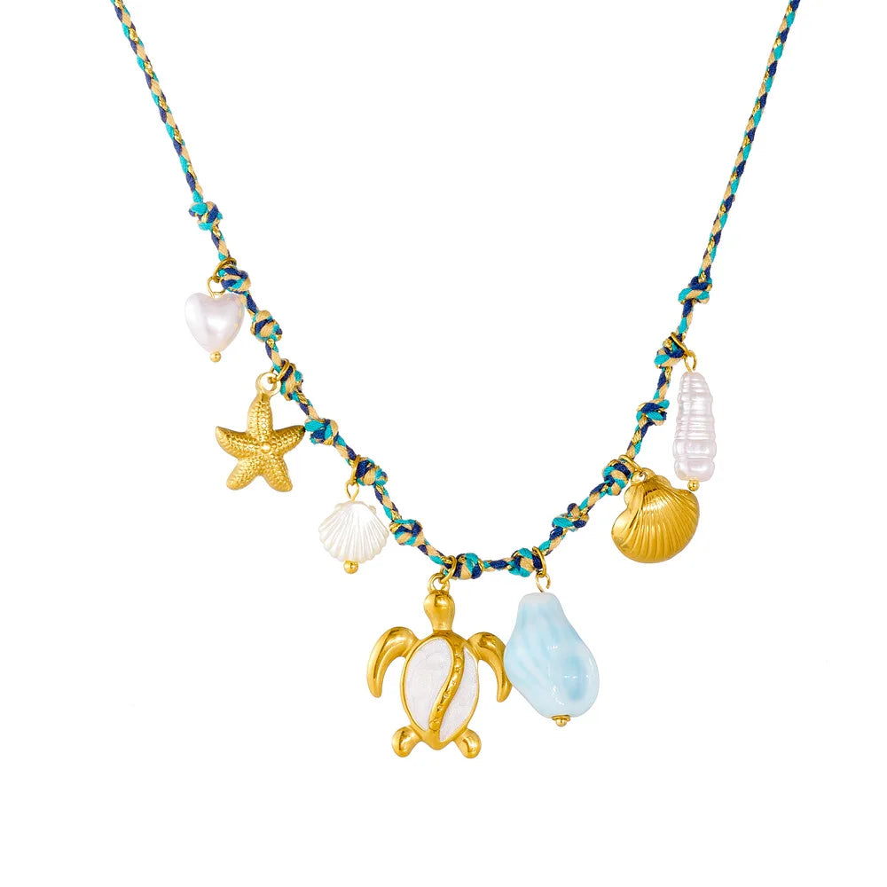 Collier doré tortue et étoile de mer