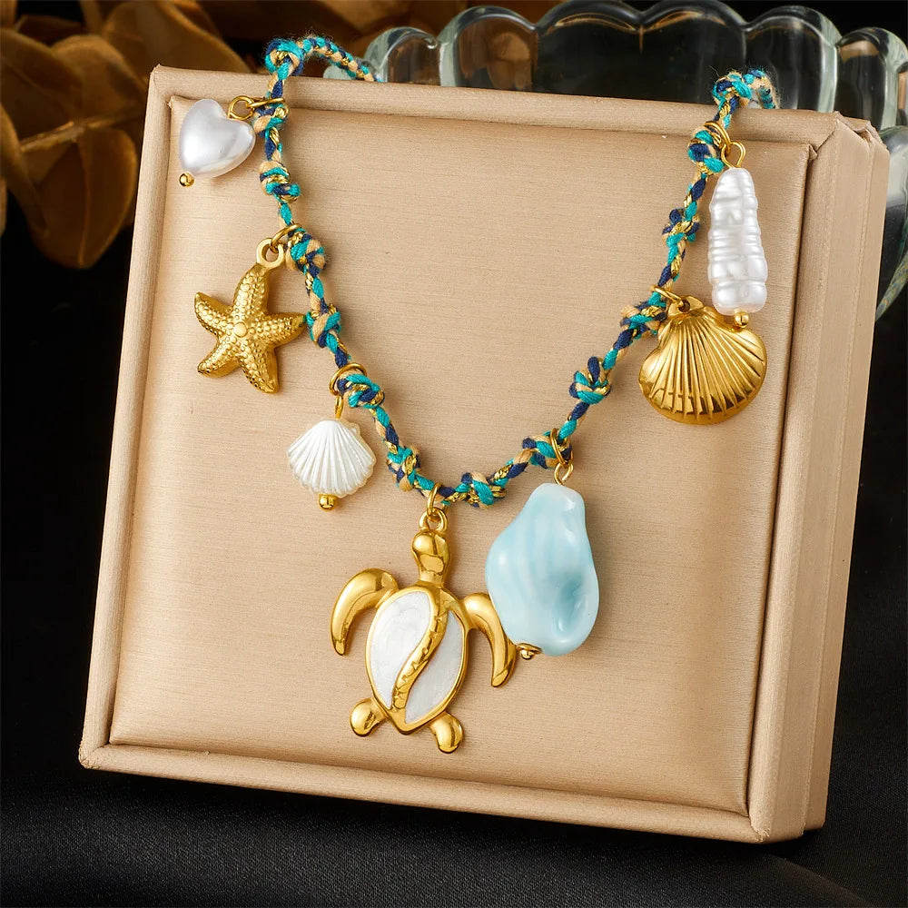 Collier doré tortue et étoile de mer